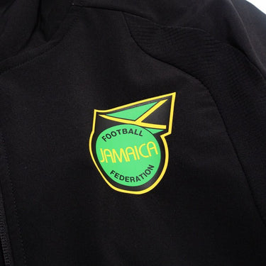 Logo Jamaïque sur le coupe vent noir 2026.