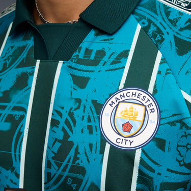Logo Manchester City sur le maillot Retro KING homme.